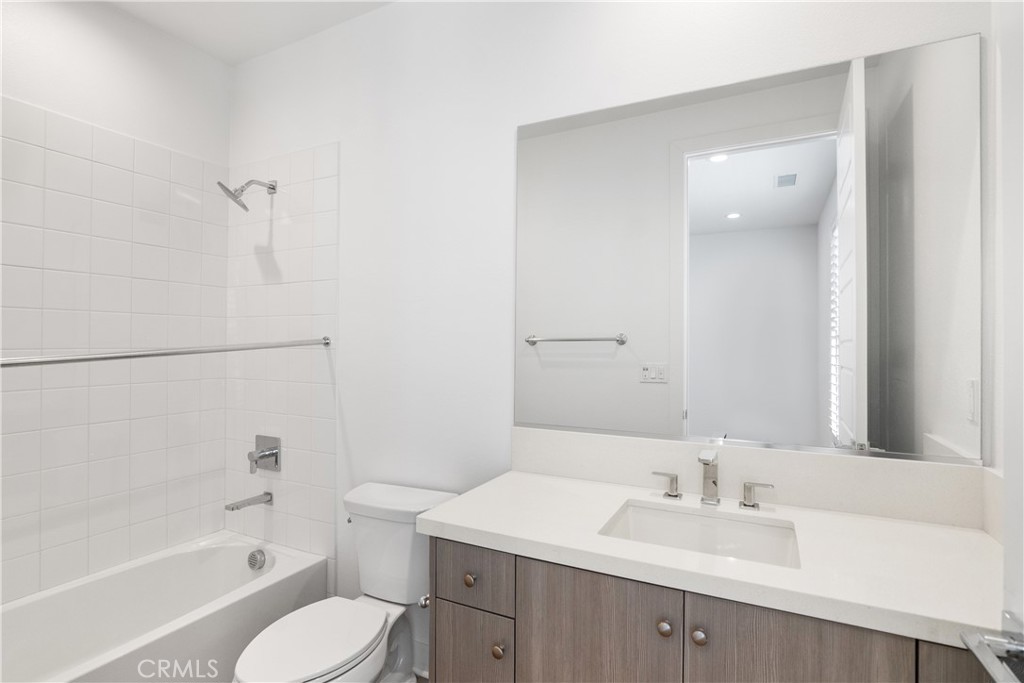 11734 Hillsborough Lane Porter Ranch, CA 91326 - Photo 32 of 34 a bathroom with a sink a toilet and shower