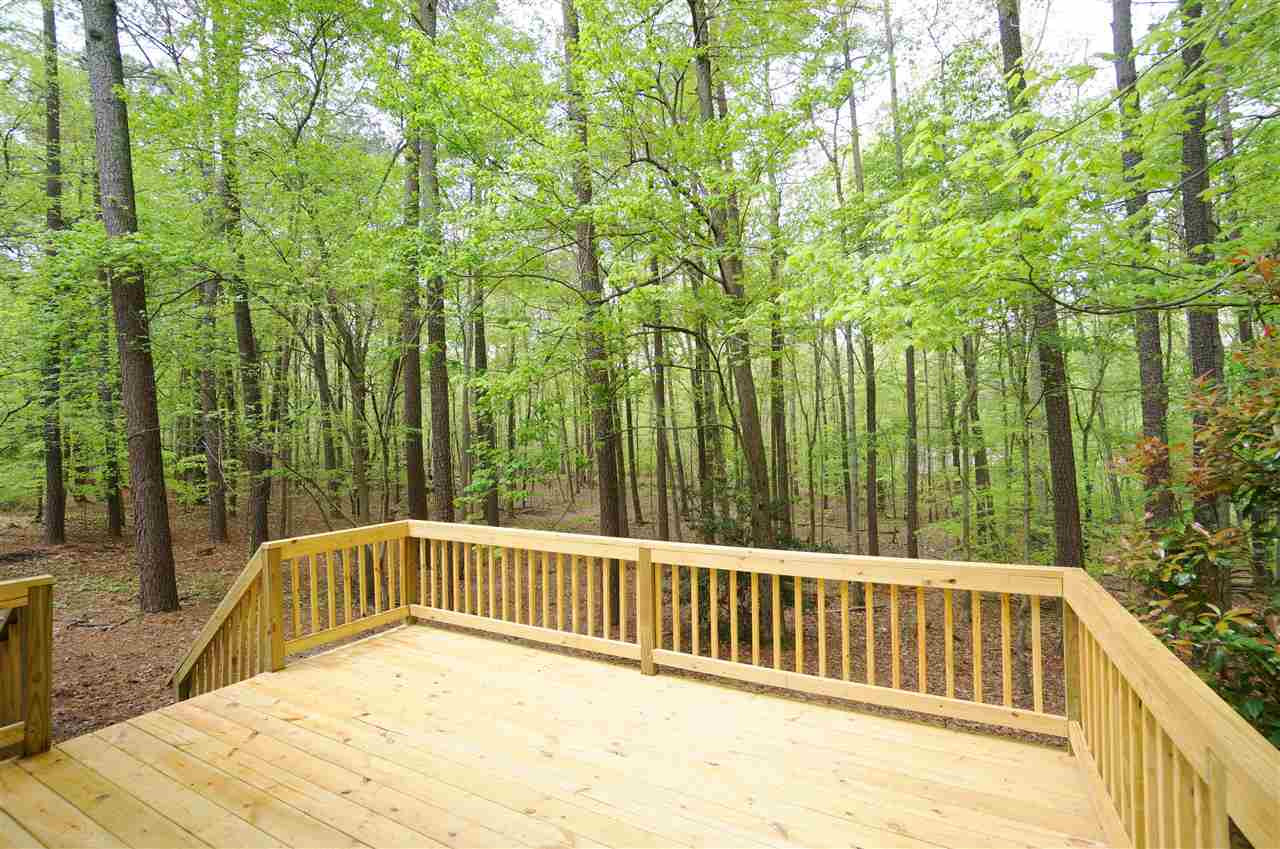 10101 Boxelder Drive Raleigh, NC 27613 - Photo 21 of 25 Brand new back deck is large & in charge of providing the perfect stage for Summer time cook outs. Spring time cocktails, and watching the changing colors of the Autumn leaves. Patio/Deck