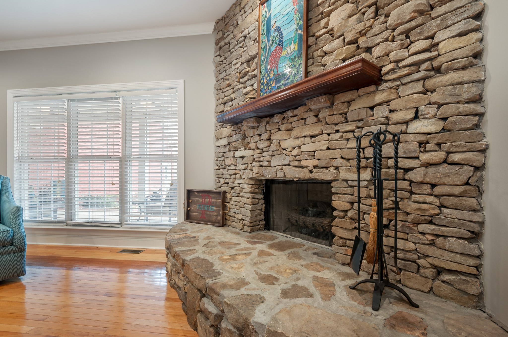 876 Baker Road Columbia, TN 38401 - Photo 17 of 48 a view of empty room with fireplace and wooden floor