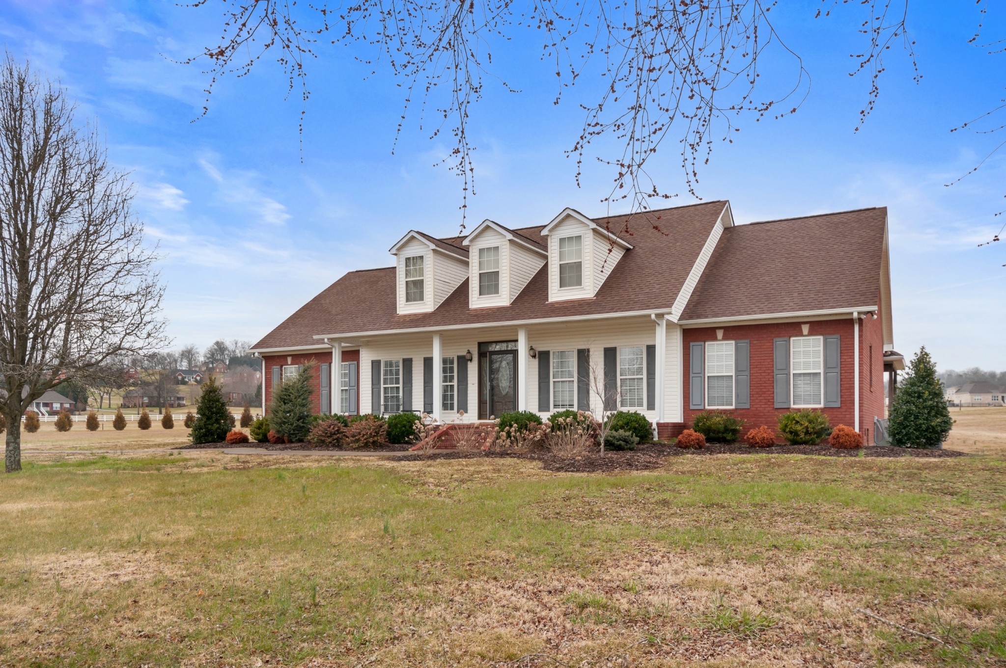 876 Baker Road Columbia, TN 38401 - Photo 2 of 48 a front view of a house with garden