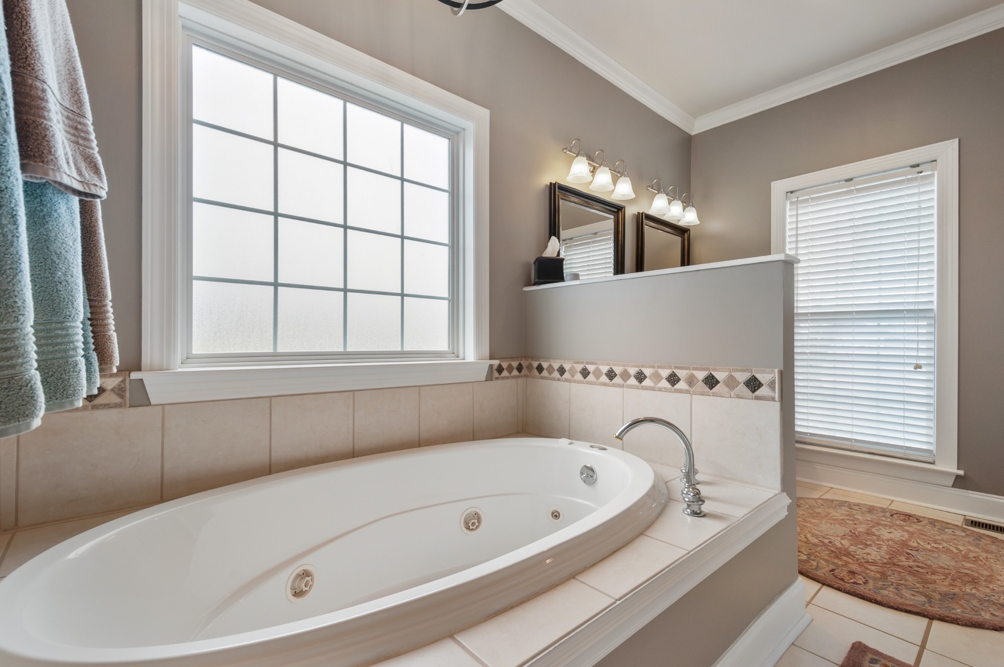876 Baker Road Columbia, TN 38401 - Photo 22 of 48 a bathroom with a bathtub and a window