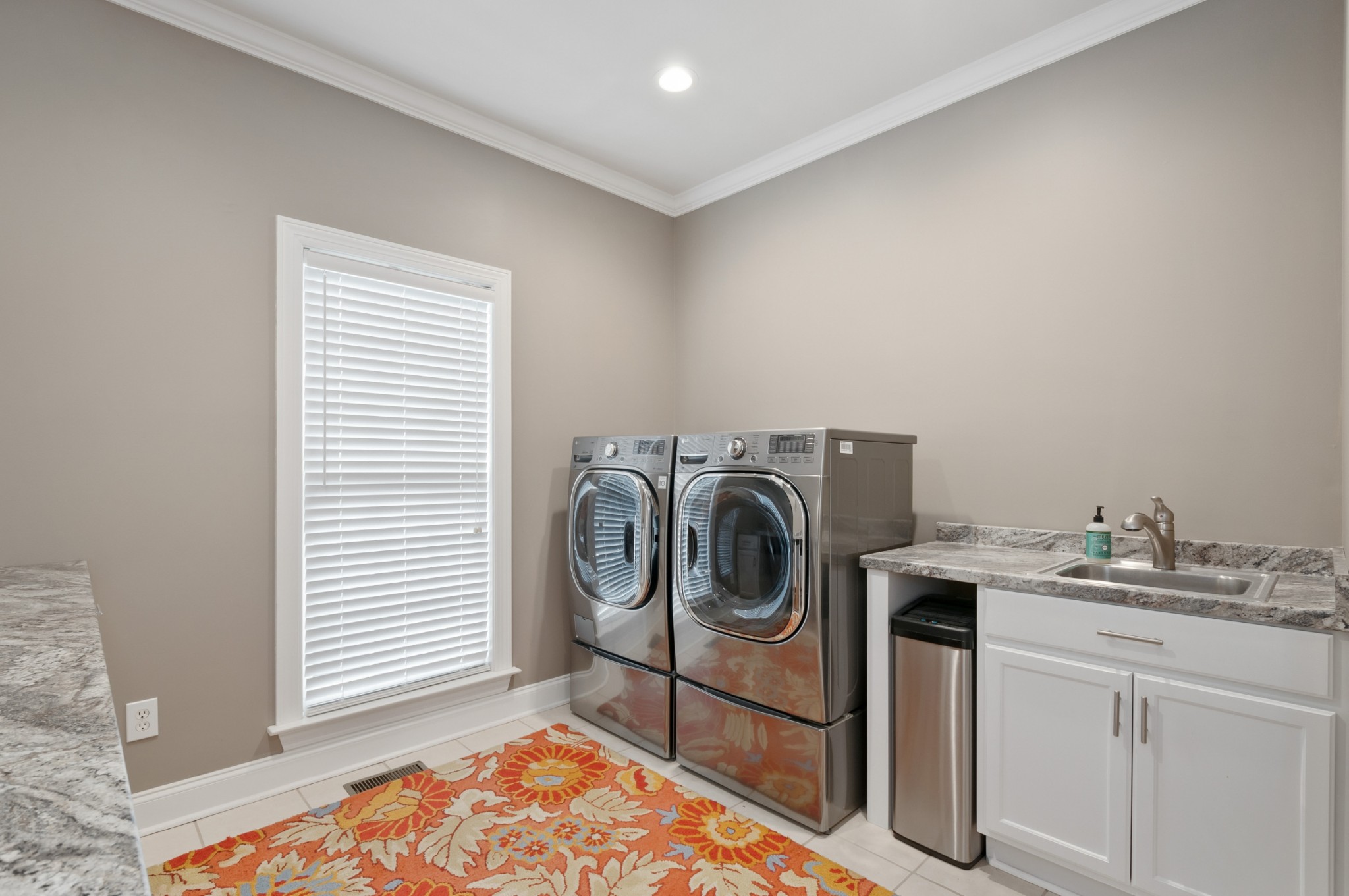 876 Baker Road Columbia, TN 38401 - Photo 26 of 48 a utility room with a sink dryer and washer