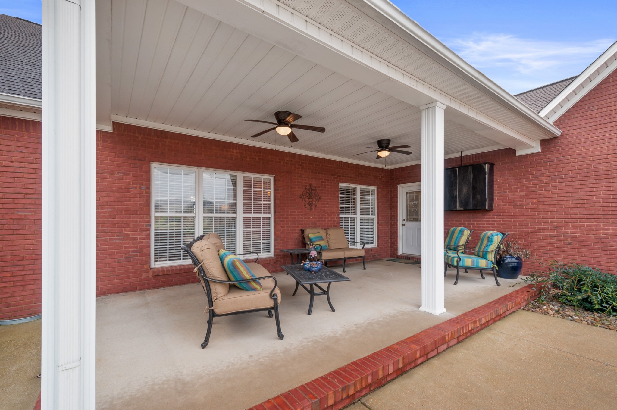 876 Baker Road Columbia, TN 38401 - Photo 35 of 48 a view of a patio with a table and chairs