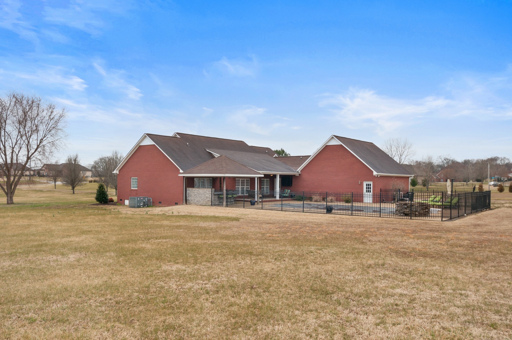 876 Baker Road Columbia, TN 38401 - Photo 42 of 48 a large house with a big yard and large trees