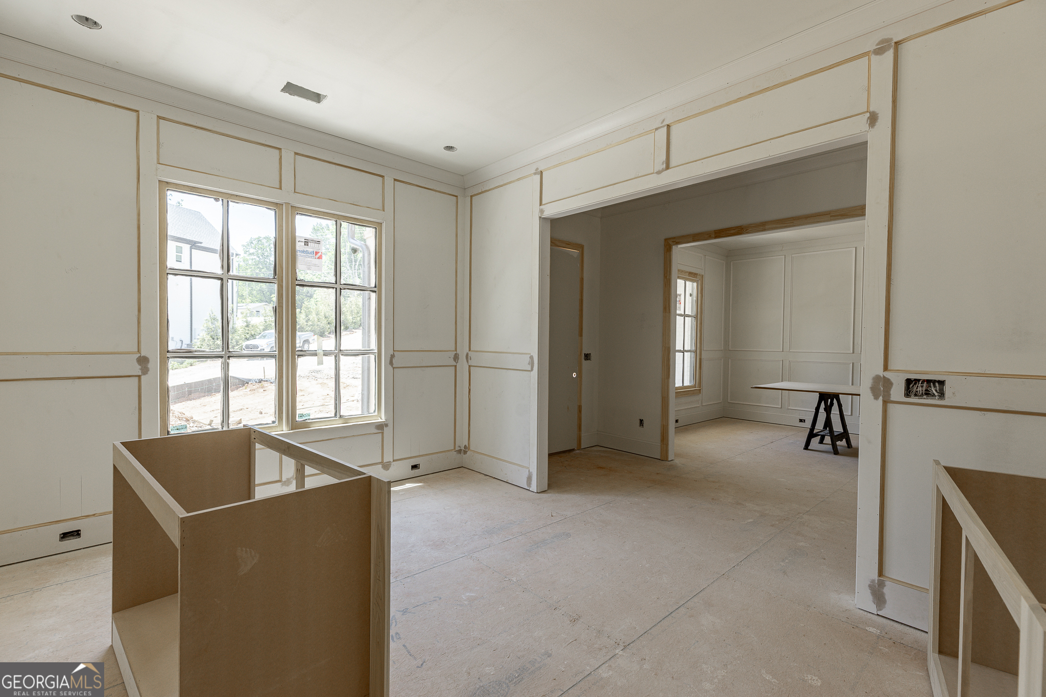 2969 North Bogan Road Northeast, Unit 1 Buford, GA 30519 - Photo 8 of 51 a view of an empty room with a window