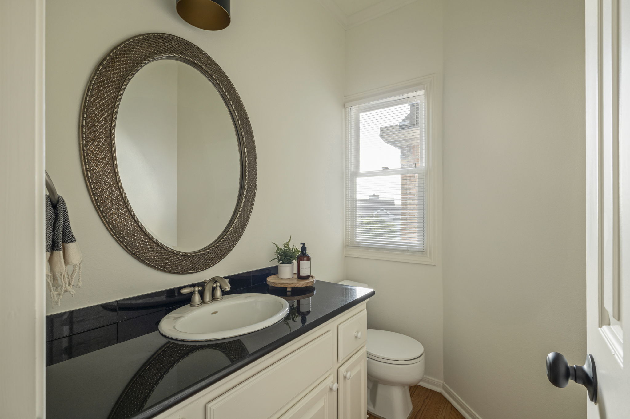 6010 Long Champ Court, Unit 113 Austin, TX 78746 - Photo 19 of 25 Bathroom with vanity and ornamental molding