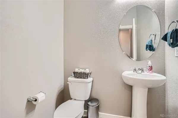 a bathroom with a sink double vanity and a mirror