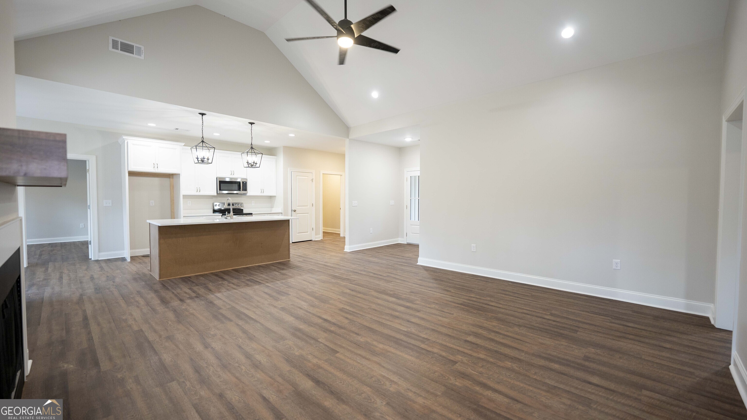 288 Frank Cook Road Cochran, GA 31014 - Photo 7 of 40 a view of a kitchen with a sink and a stove top oven