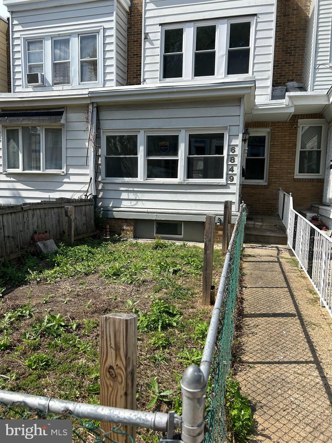 6849 Regent Street Philadelphia, PA 19142 - Photo 2 of 5 a house view with a garden space
