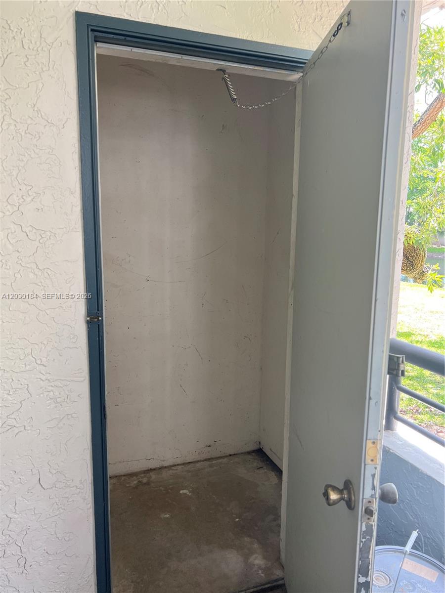 951 Lyons Road, Unit 6104 Coconut Creek, FL 33063 - Photo 9 of 18 a view of an empty room