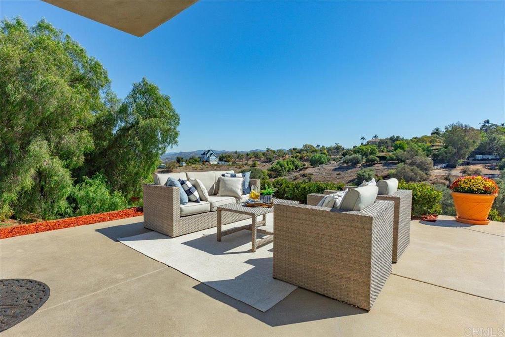 5382 Willman Way Fallbrook, CA 92028 - Photo 13 of 64 a view of a terrace with couches and sky view
