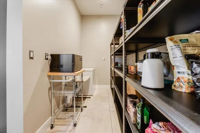 a large bathroom with a granite countertop tub a sink a mirror and a shower