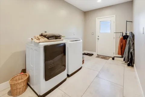 a view of kitchen with furniture and wooden floor