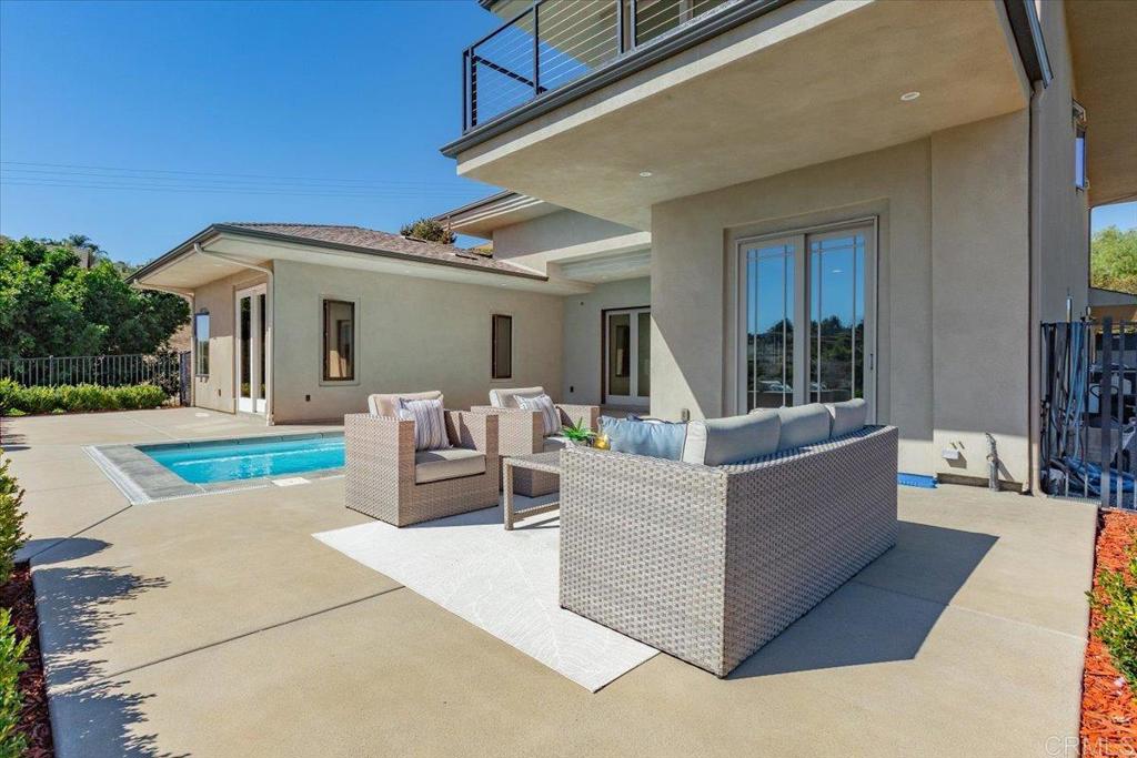 5382 Willman Way Fallbrook, CA 92028 - Photo 41 of 64 a view of a house with couches and a table