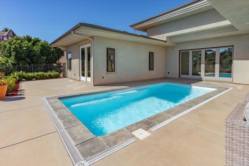 5382 Willman Way Fallbrook, CA 92028 - Photo 44 of 64 a front view of a house with a yard