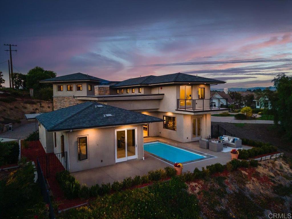 5382 Willman Way Fallbrook, CA 92028 - Photo 46 of 64 a front view of a house with a yard