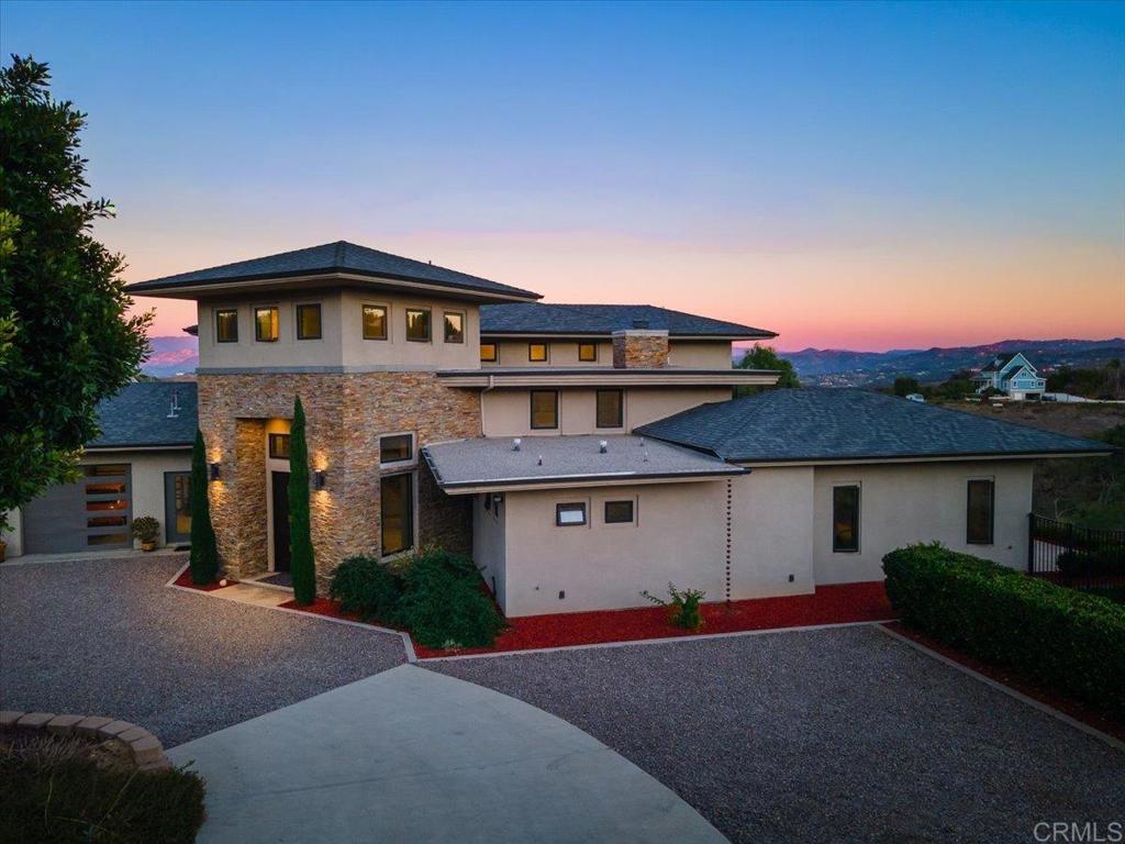 5382 Willman Way Fallbrook, CA 92028 - Photo 47 of 64 a front view of a house with a yard