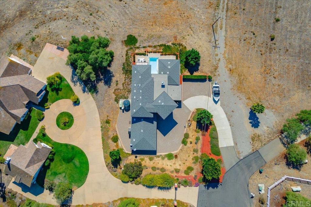 5382 Willman Way Fallbrook, CA 92028 - Photo 55 of 64 an aerial view of a house with a swimming pool