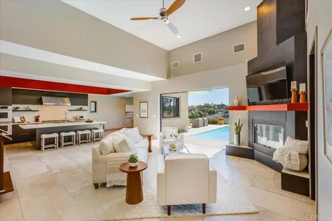 a spacious kitchen with stainless steel appliances kitchen island granite countertop a sink and cabinets
