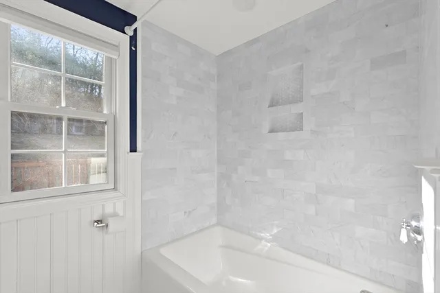 a bathroom with a bathtub