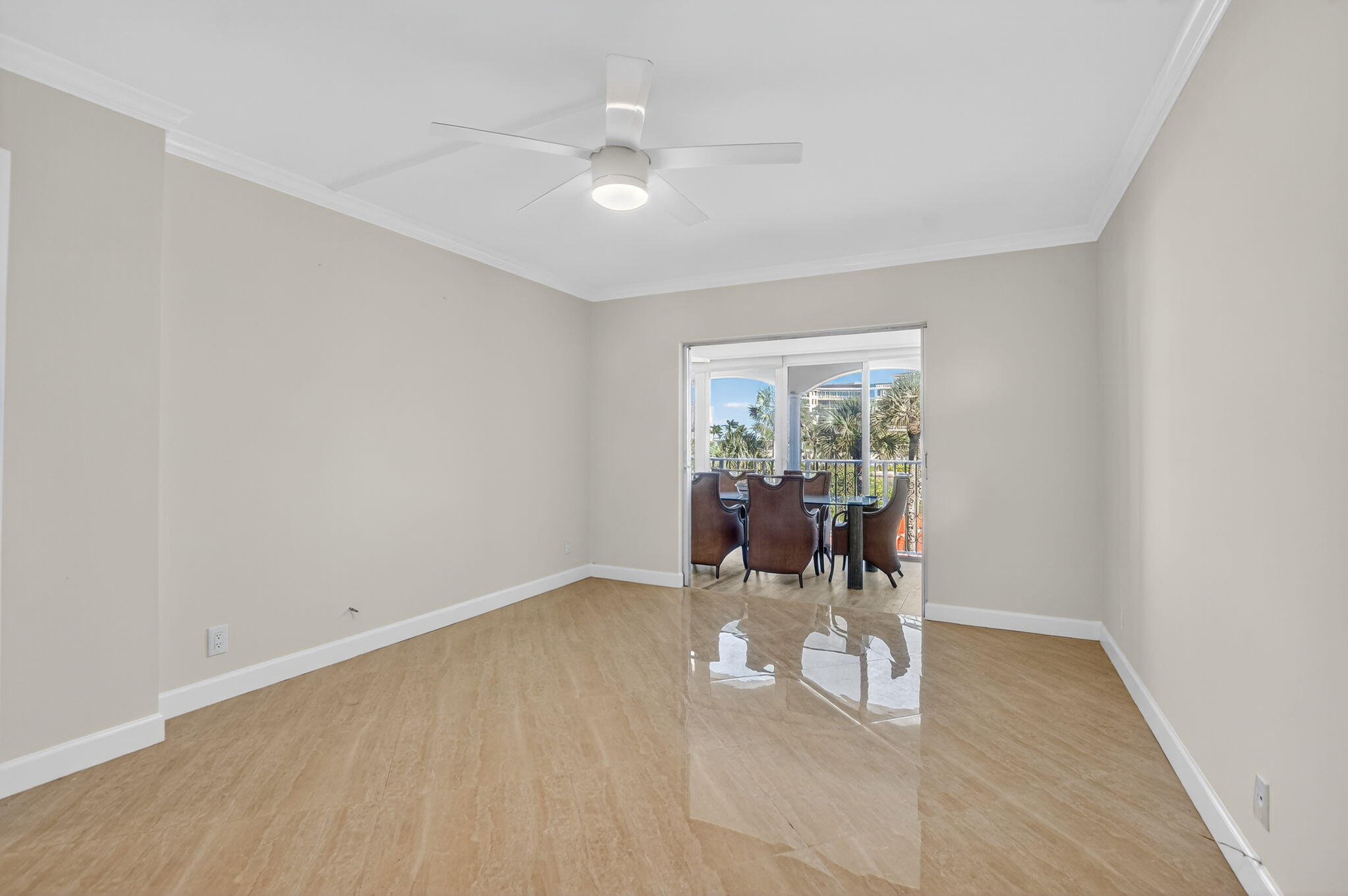 1040 Banyan Road, Unit 3050 Boca Raton, FL 33432 - Photo 19 of 35 a view of a big room with wooden floor and dining room view