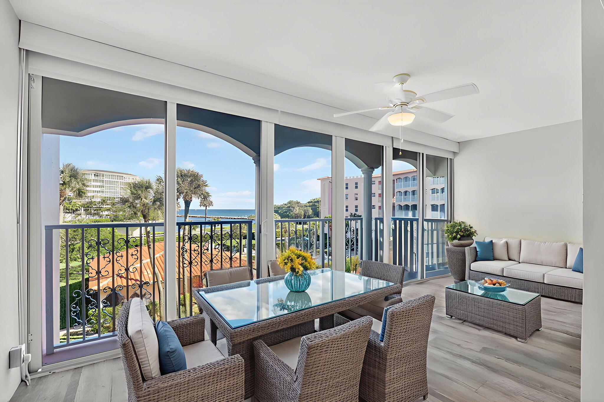 1040 Banyan Road, Unit 3050 Boca Raton, FL 33432 - Photo 28 of 35 a living room with furniture and a floor to ceiling window