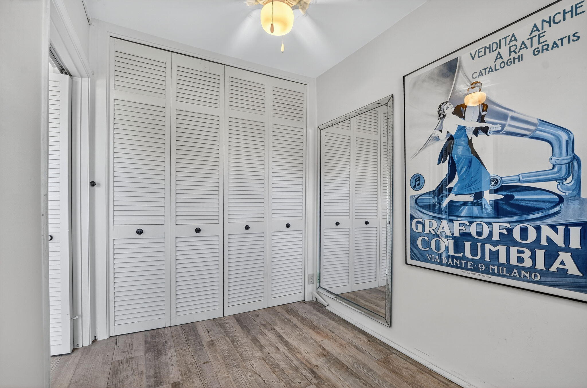 1040 Banyan Road, Unit 3050 Boca Raton, FL 33432 - Photo 30 of 35 a view of an entryway with wooden floor