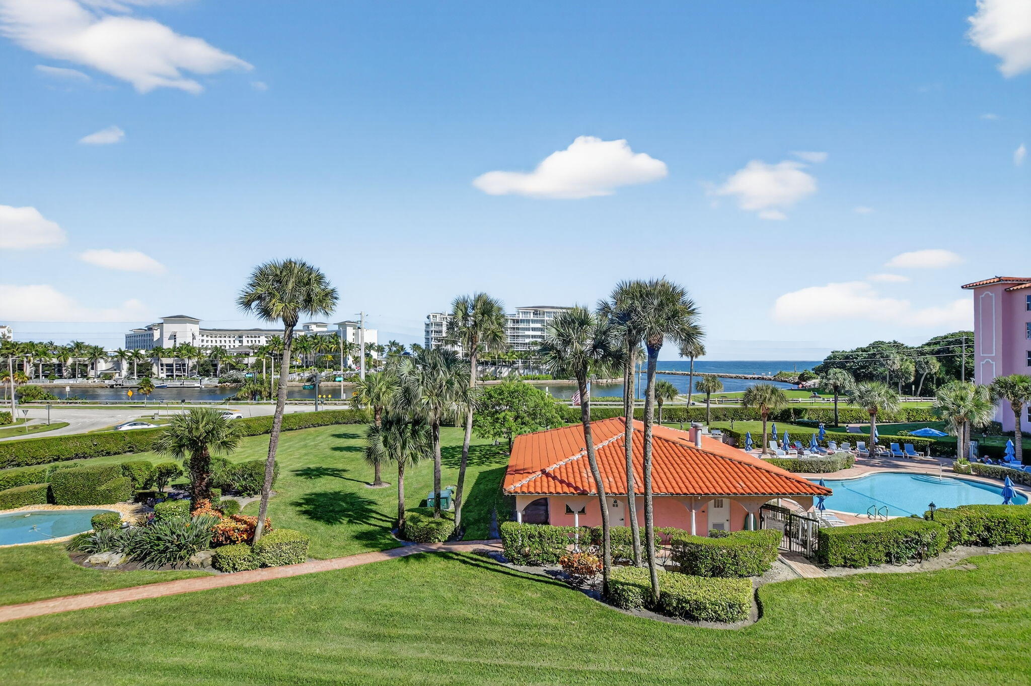 1040 Banyan Road, Unit 3050 Boca Raton, FL 33432 - Photo 34 of 35 a view of a garden with a lake