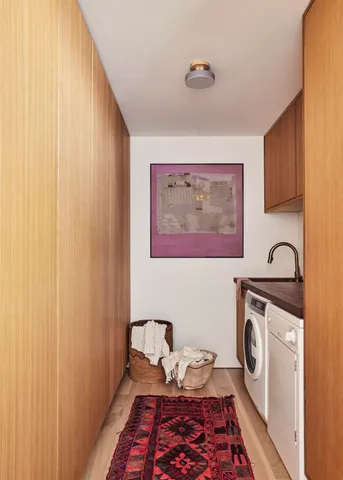 a view of a utility room with washer and dryer