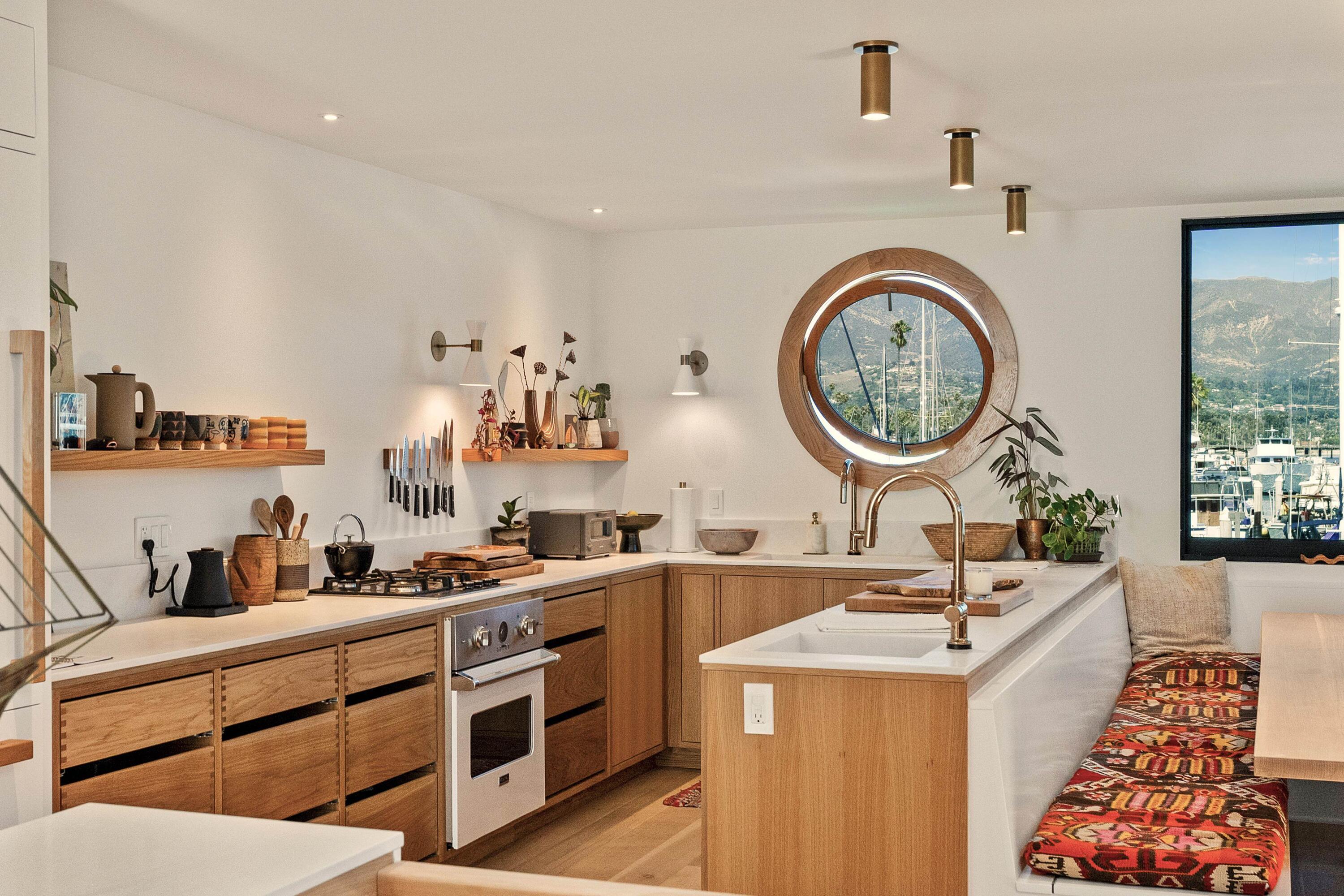0 Santa Barbara Harbor, Unit MARINA 3C SLIP ST13 Santa Barbara, CA 93109 - Photo 4 of 26 a kitchen with a sink stove and cabinets