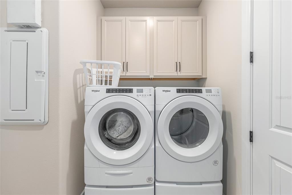 8986 Southwest 58th Street Road Ocala, FL 34481 - Photo 32 of 53 a utility room with dryer and washer