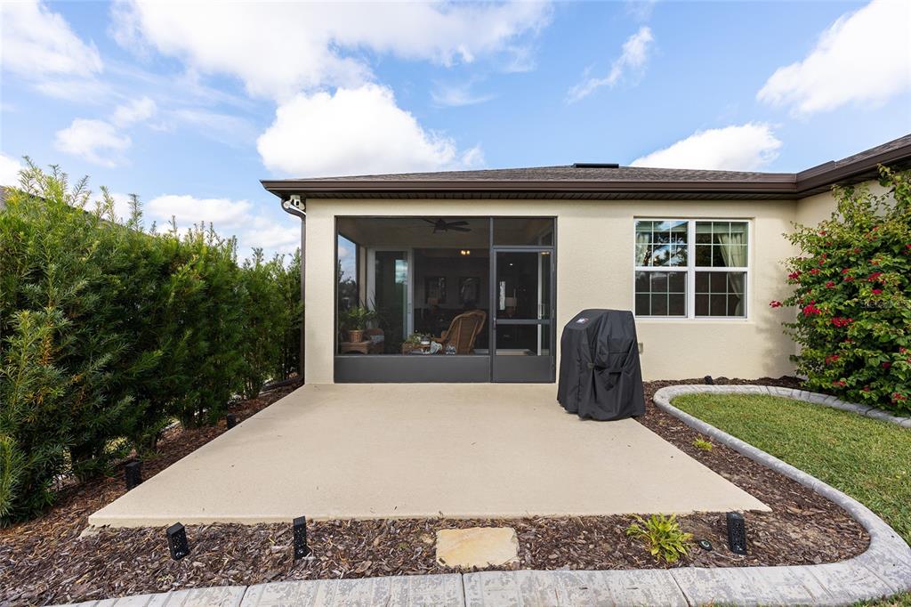 8986 Southwest 58th Street Road Ocala, FL 34481 - Photo 37 of 53 a view of a house with backyard porch and sitting area