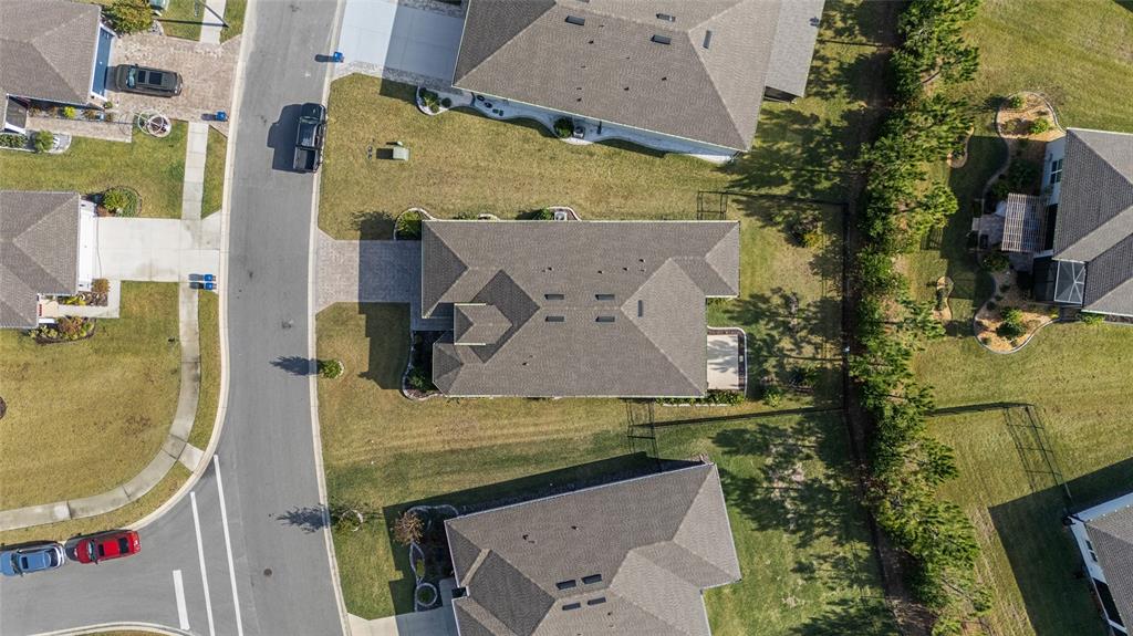 8986 Southwest 58th Street Road Ocala, FL 34481 - Photo 41 of 53 an aerial view of residential houses with outdoor space