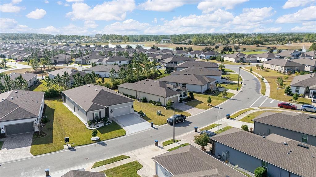 8986 Southwest 58th Street Road Ocala, FL 34481 - Photo 43 of 53 an aerial view of residential houses with outdoor space