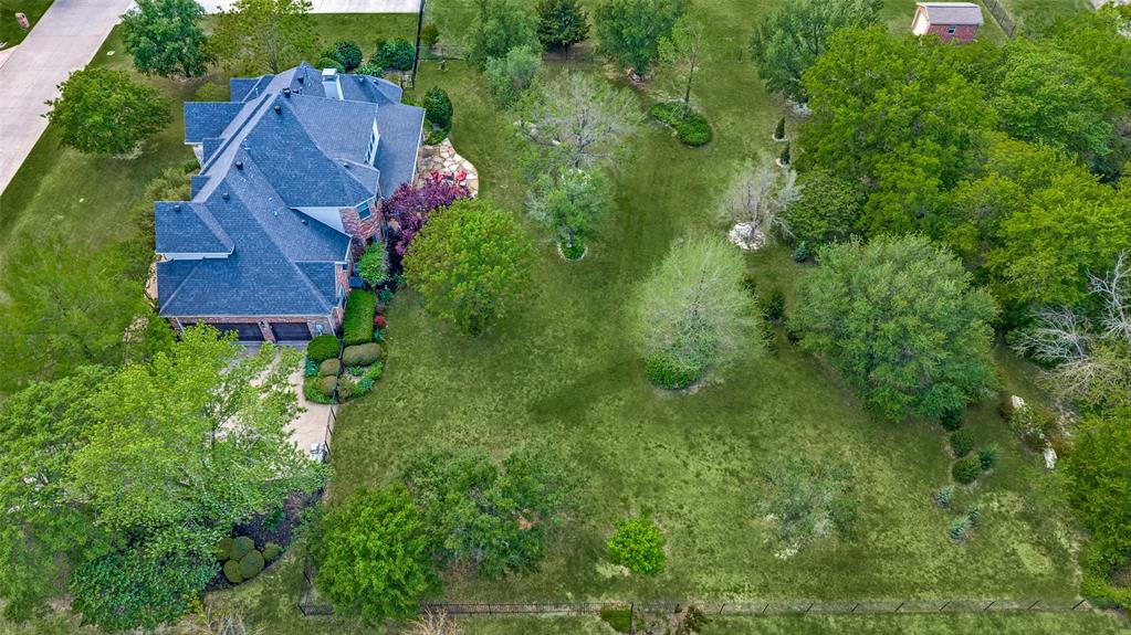 2841 Winding Creek Road Prosper, TX 75078 - Photo 37 of 40 an aerial view of residential house with outdoor space and trees all around