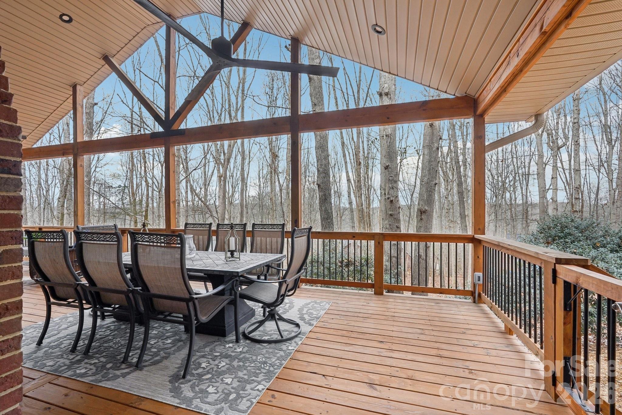 11655 Terrill Ridge Drive Davidson, NC 28036 - Photo 13 of 40 a dining room with furniture and wooden floor
