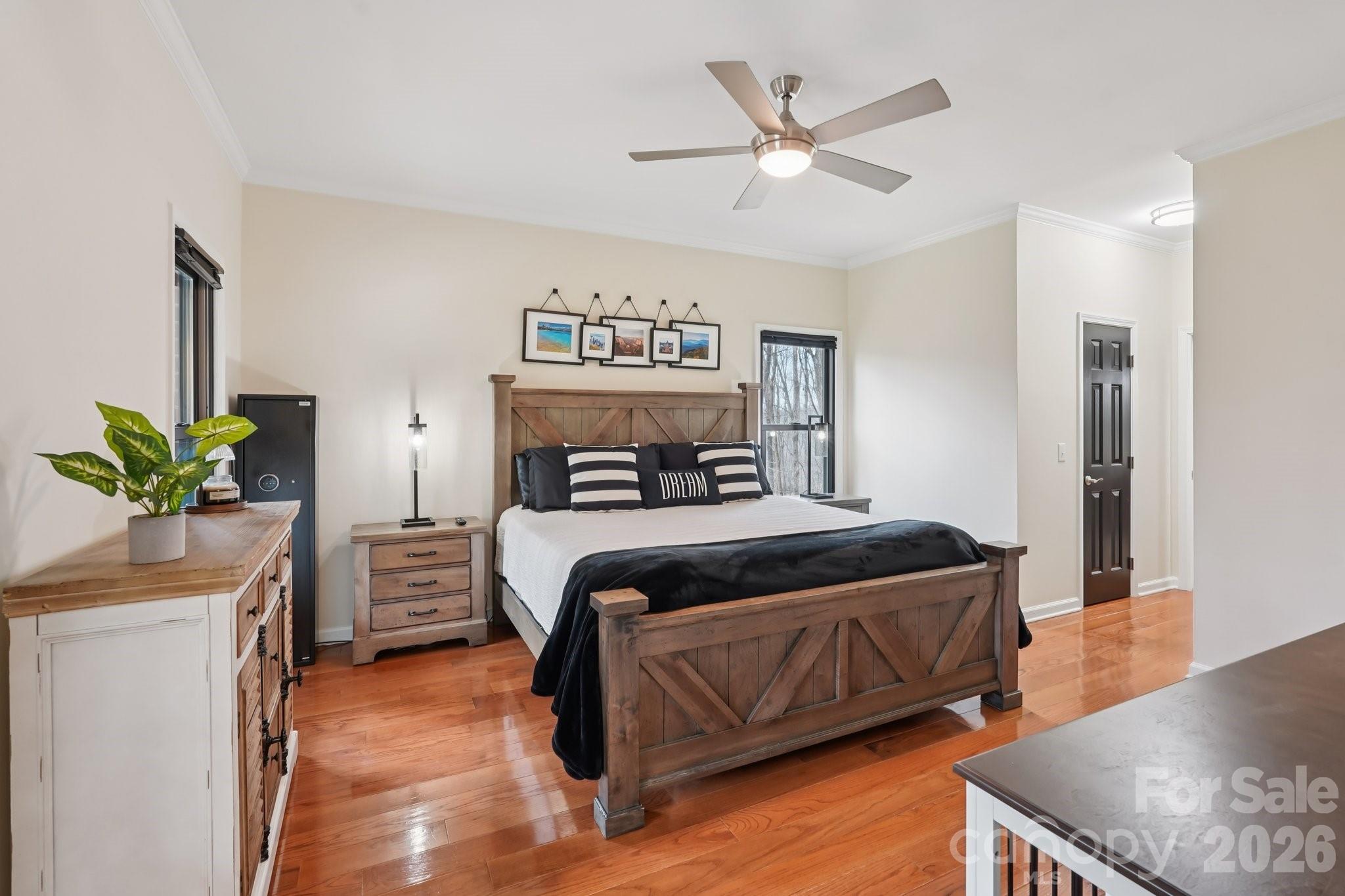 11655 Terrill Ridge Drive Davidson, NC 28036 - Photo 14 of 40 a bedroom with a bed and a potted plant