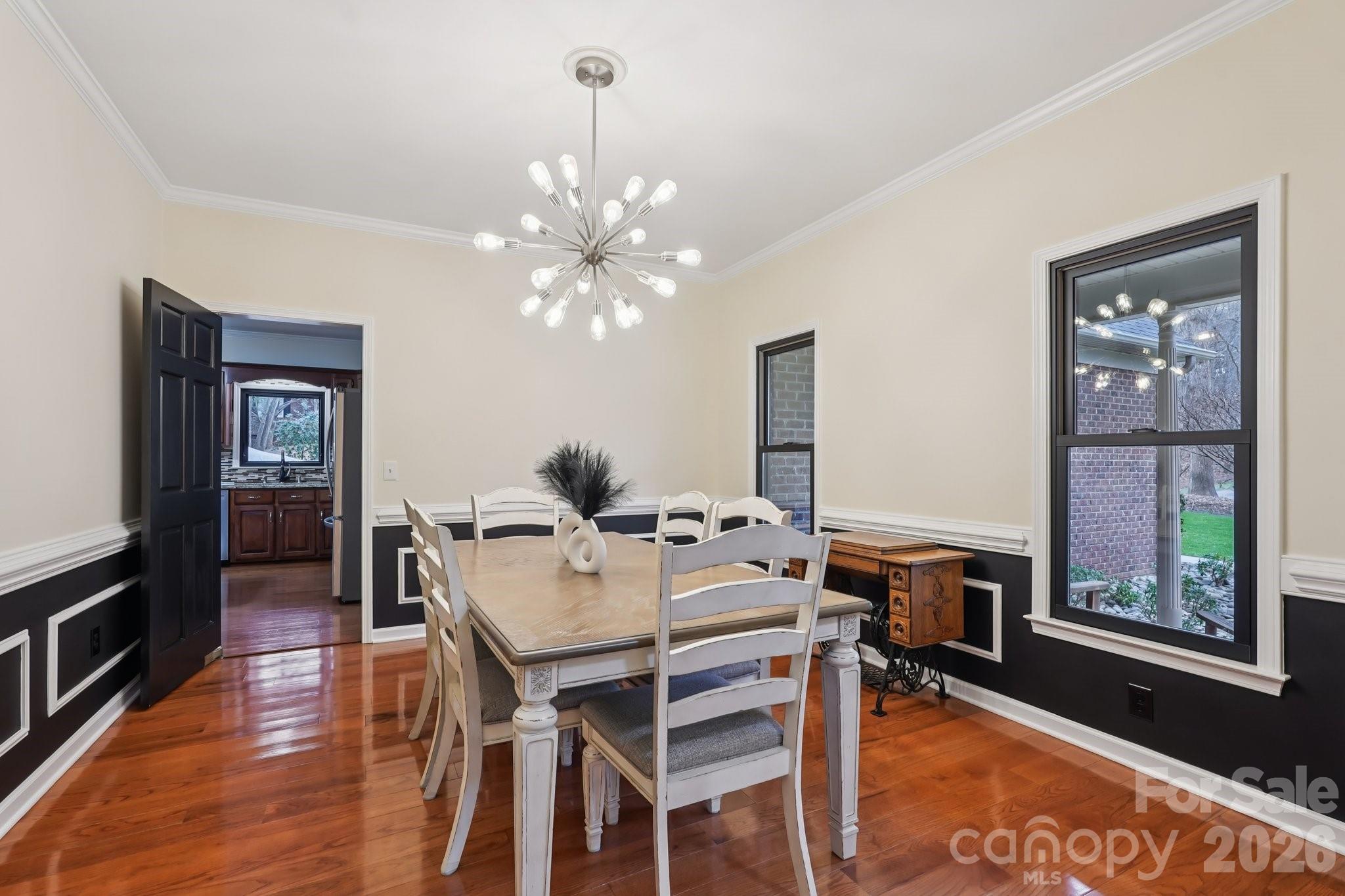 11655 Terrill Ridge Drive Davidson, NC 28036 - Photo 25 of 40 a view of a dining room with furniture window and wooden floor
