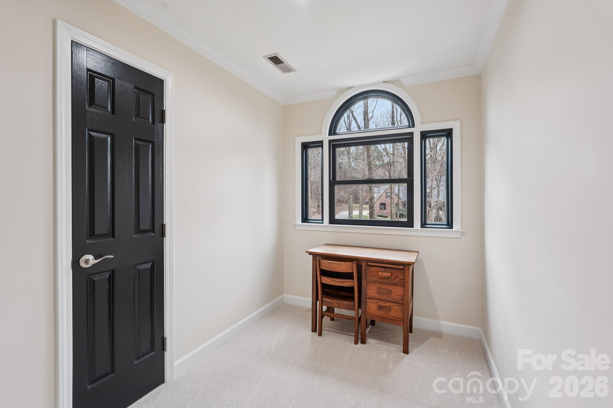 11655 Terrill Ridge Drive Davidson, NC 28036 - Photo 26 of 40 a view of a livingroom with furniture and a window