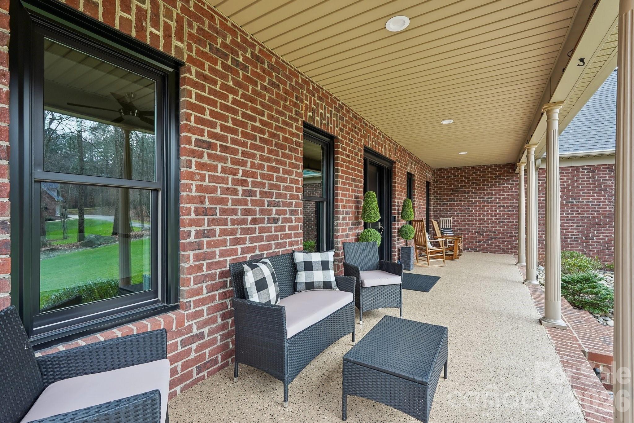 11655 Terrill Ridge Drive Davidson, NC 28036 - Photo 3 of 40 a building outdoor space with patio furniture