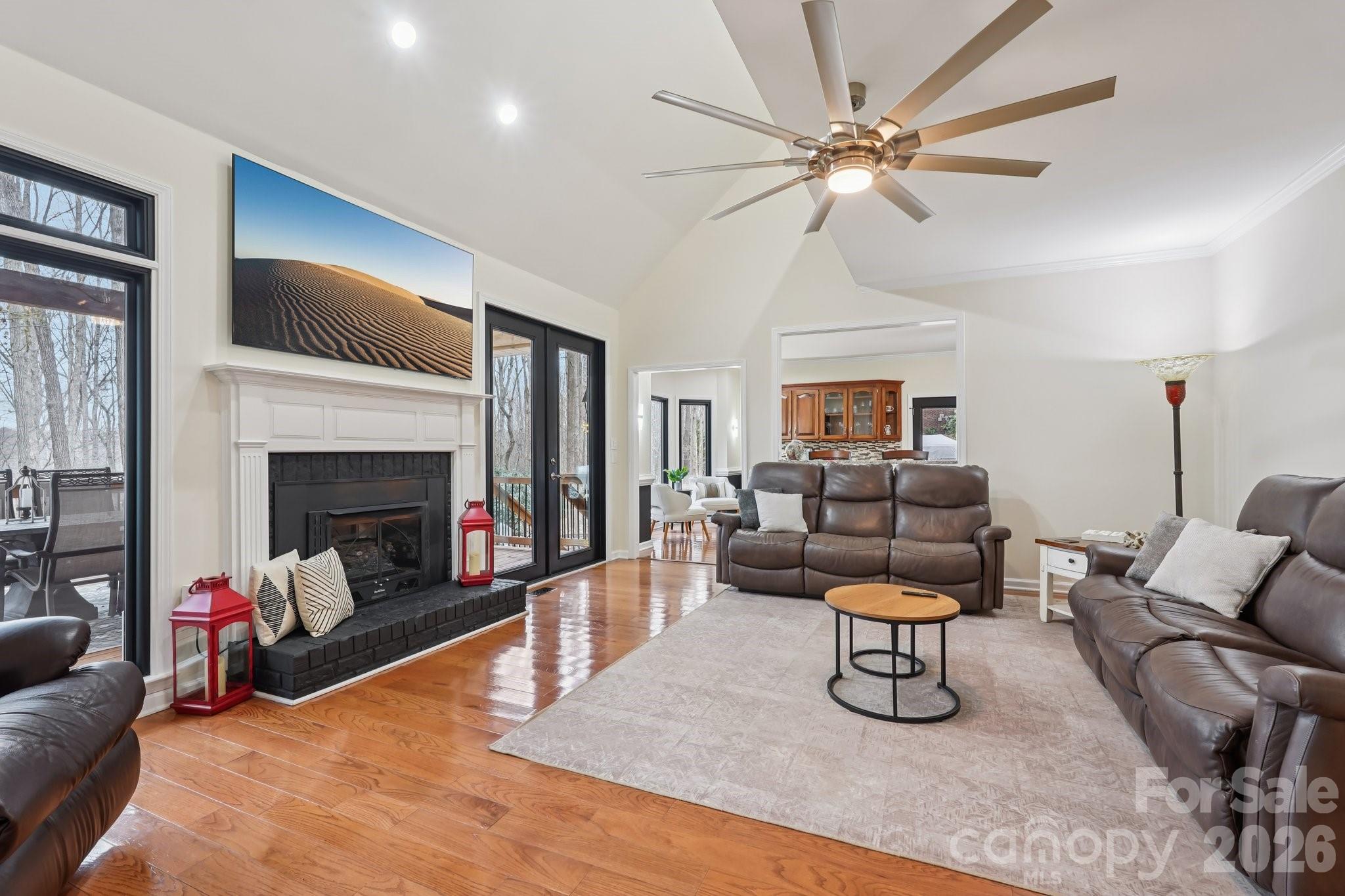 11655 Terrill Ridge Drive Davidson, NC 28036 - Photo 6 of 40 a living room with furniture and a fireplace