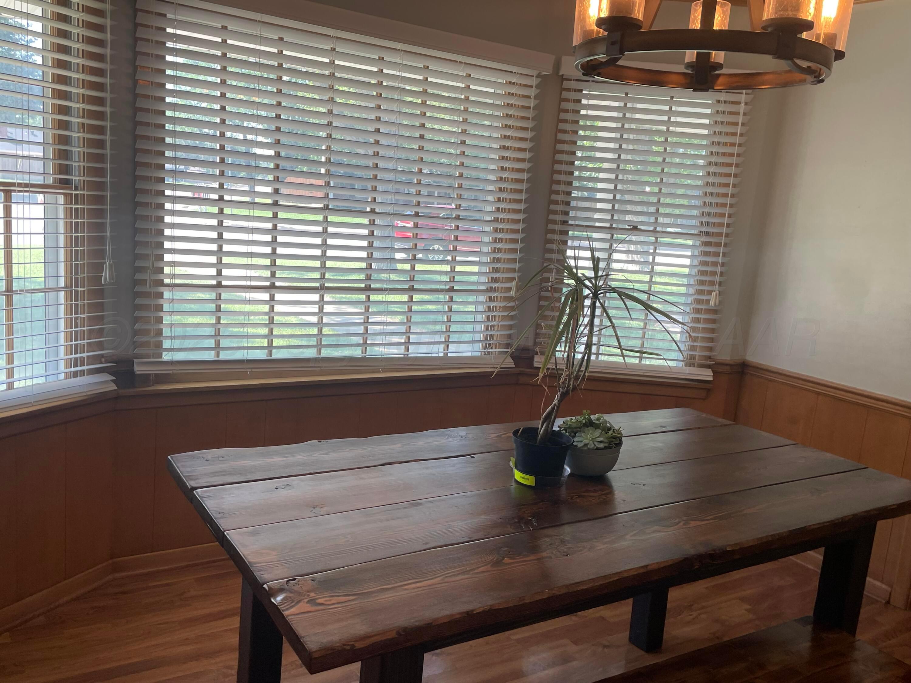 6200 Hanson Road Amarillo, TX 79106 - Photo 5 of 27 a view of a room with a table and chairs