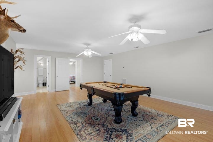24541 Baldwin Beach Expressway Robertsdale, AL 36567 - Photo 25 of 51 Game room featuring a ceiling fan, billiards, light wood-type flooring, baseboards, and visible vents