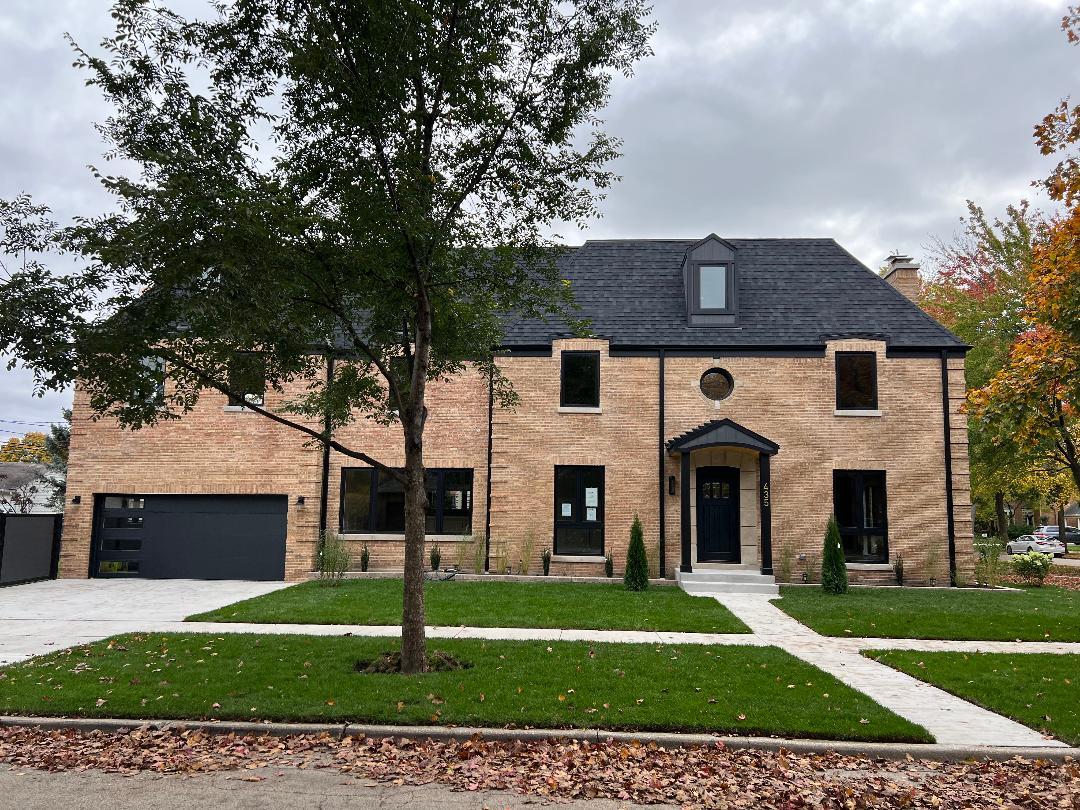 435 North Merrill Street Park Ridge, IL 60068 - Photo 1 of 50 a front view of a house with a yard