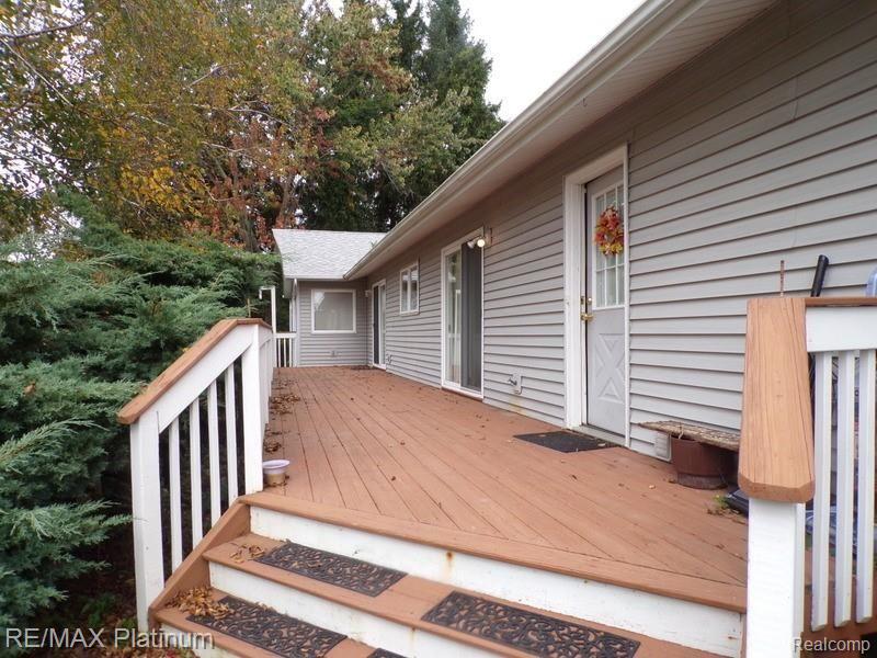 7933 North Fleming Road Fowlerville, MI 48836 - Photo 21 of 35 Back Deck