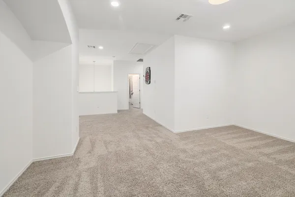 an empty room with a natural light