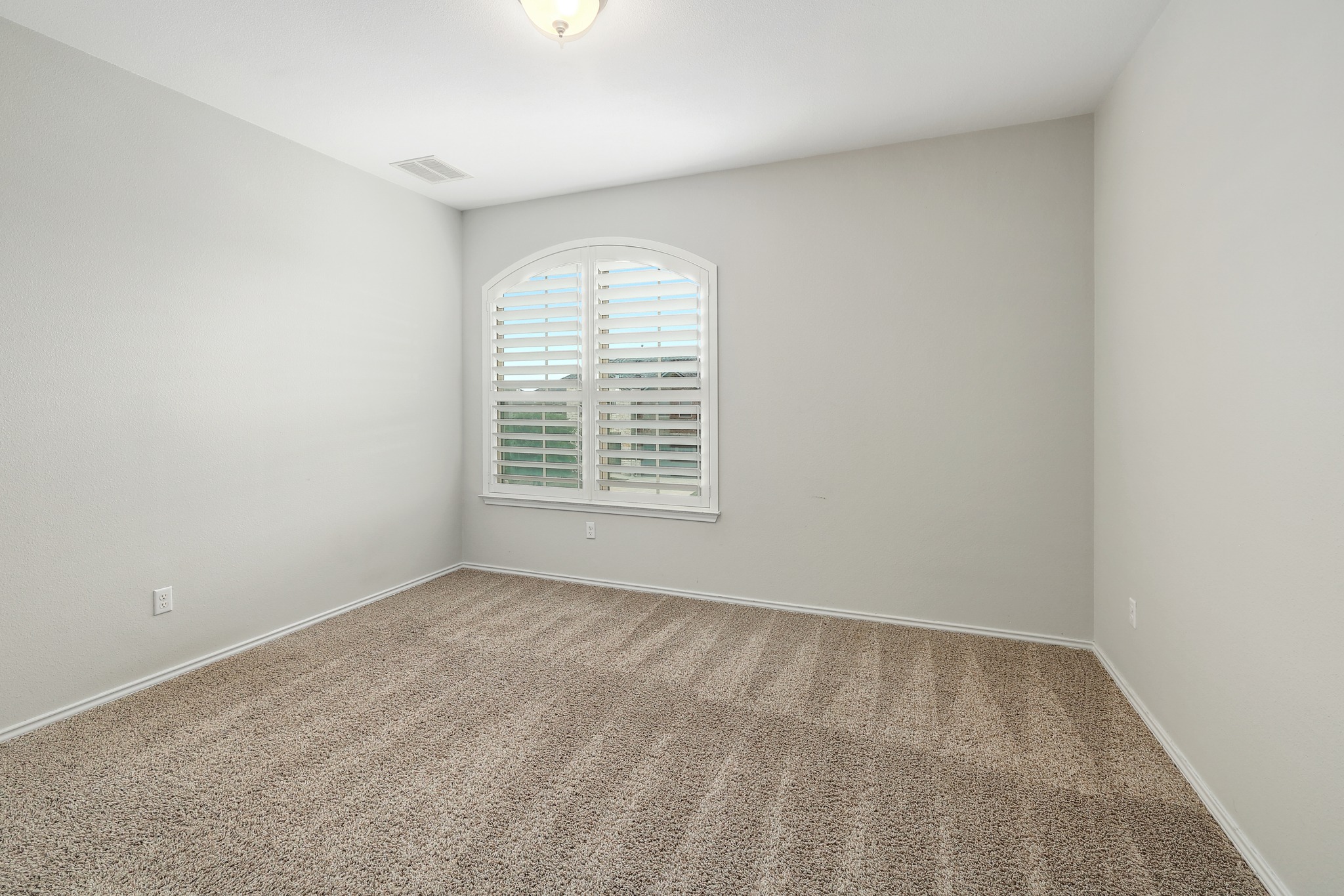 17309 Silent Harbor Loop Pflugerville, TX 78660 - Photo 24 of 38 an empty room with a window