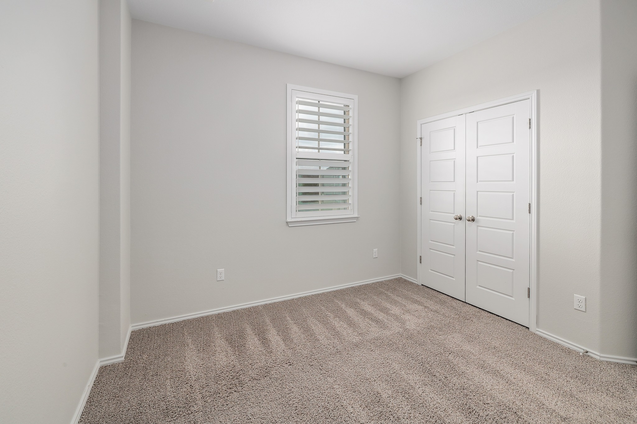 17309 Silent Harbor Loop Pflugerville, TX 78660 - Photo 26 of 38 an empty room with windows