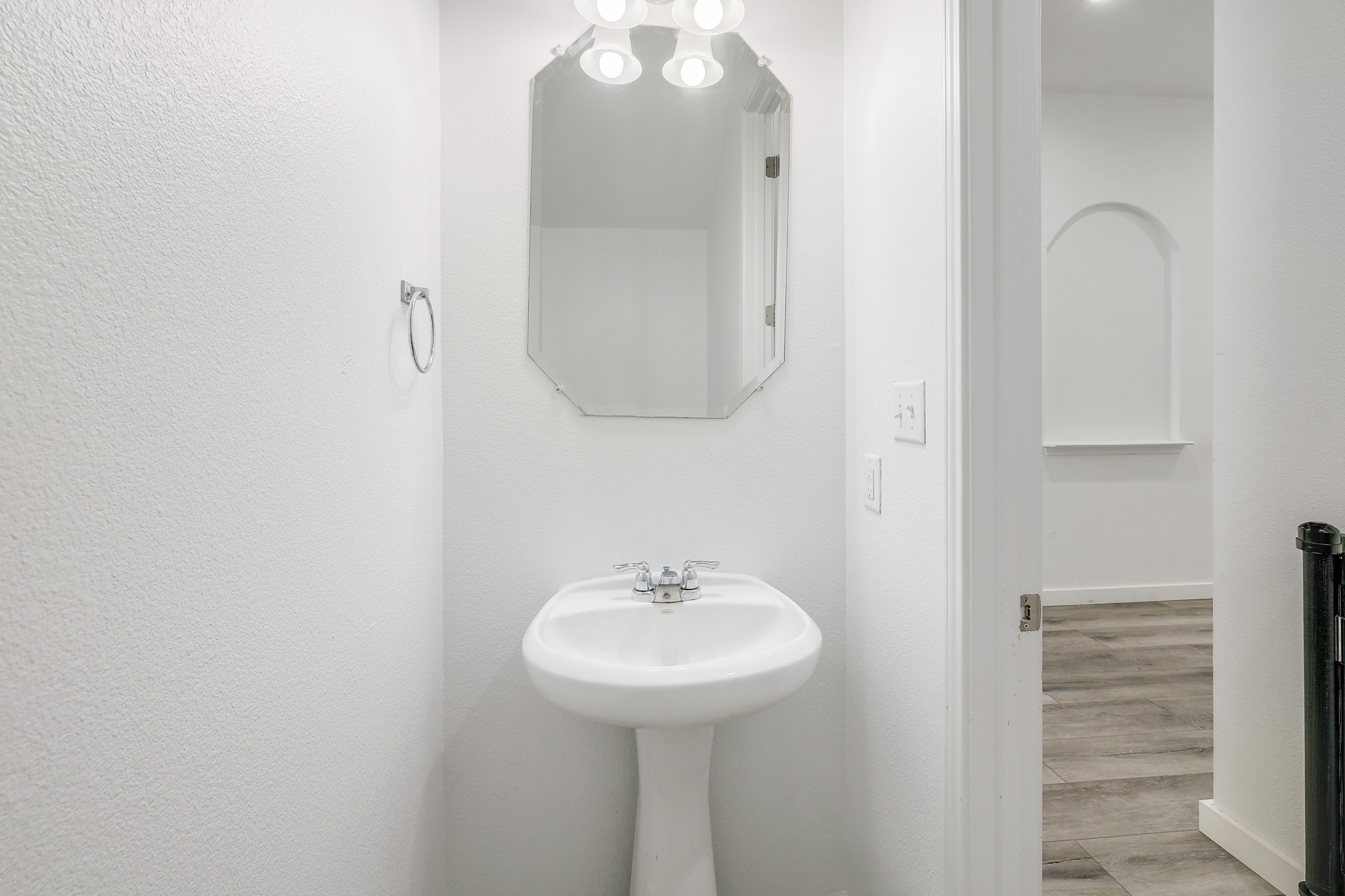17309 Silent Harbor Loop Pflugerville, TX 78660 - Photo 27 of 38 a bathroom with a sink and a mirror