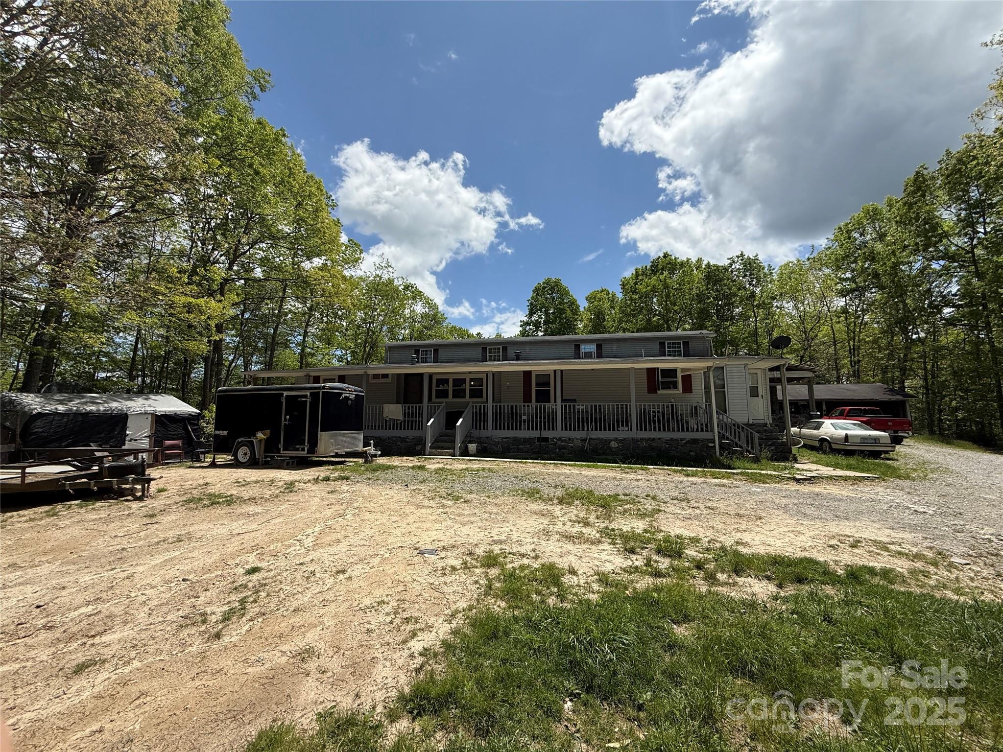 630 Deerchase Circle Cedar Mountain, NC 28718 - Photo 1 of 18 a view of a house with snow on the side of the road